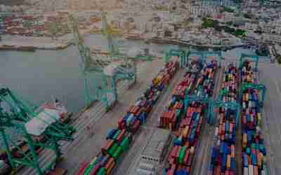 An aerial view of a port with a lot of containers.