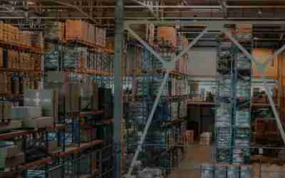 A warehouse full of boxes and pallets.