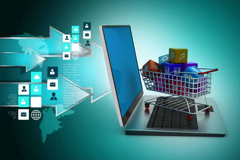 A shopping cart filled with app icons sits on a laptop keyboard, with digital arrows and icons in the background, symbolizing online shopping and e-commerce powered by seamless NetSuite 3PL integration.