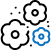 Three stylized flower shapes, one outlined in blue and two in black, with small black dots scattered around them on a white background.